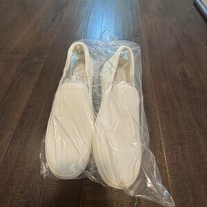 White slip on sneakers lifestyle